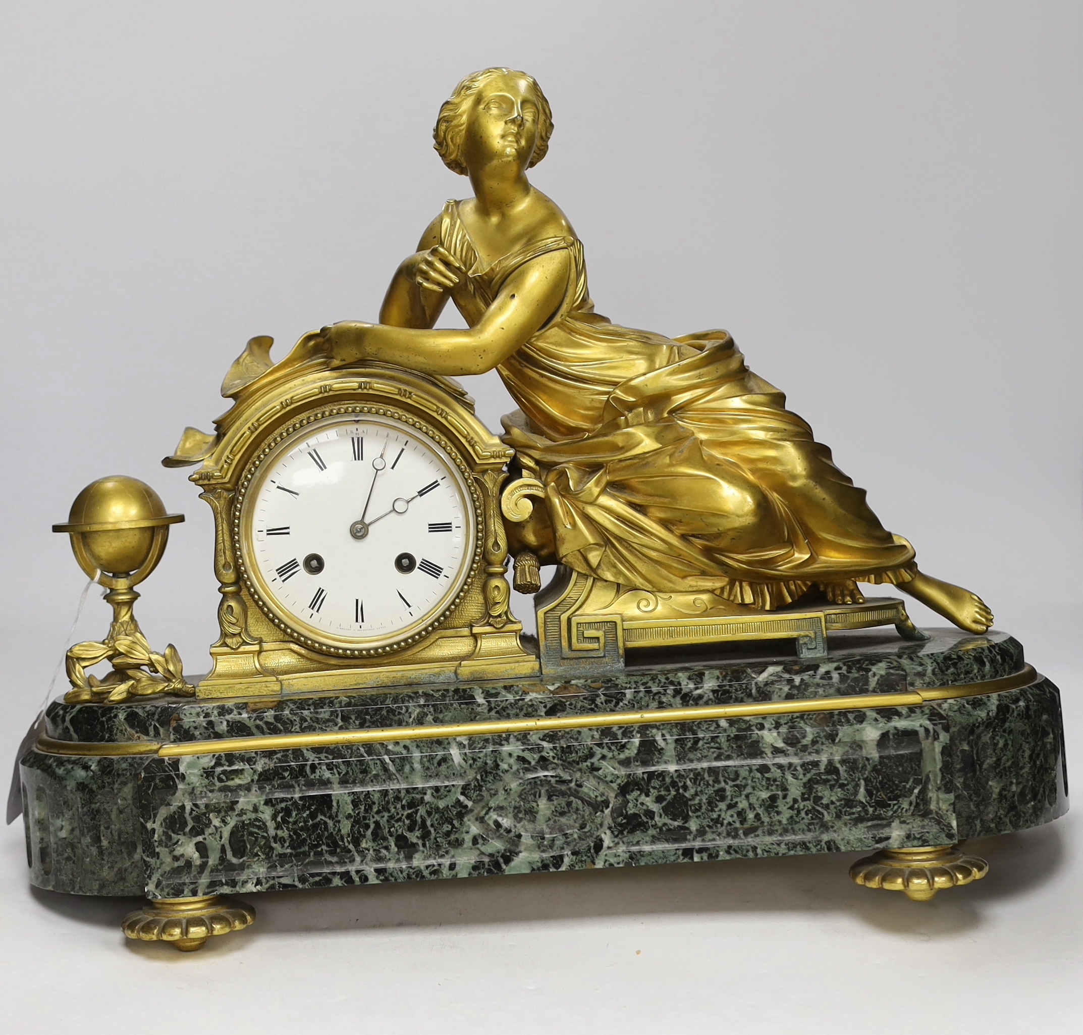 A late 19th century French ormolu and serpentine figural mantel clock, no key or pendulum, one foot missing, 47cm wide